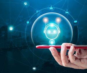 Hand holding a phone from which a glowing chatbot face rises inside a bubble, ringed by network and messaging icons