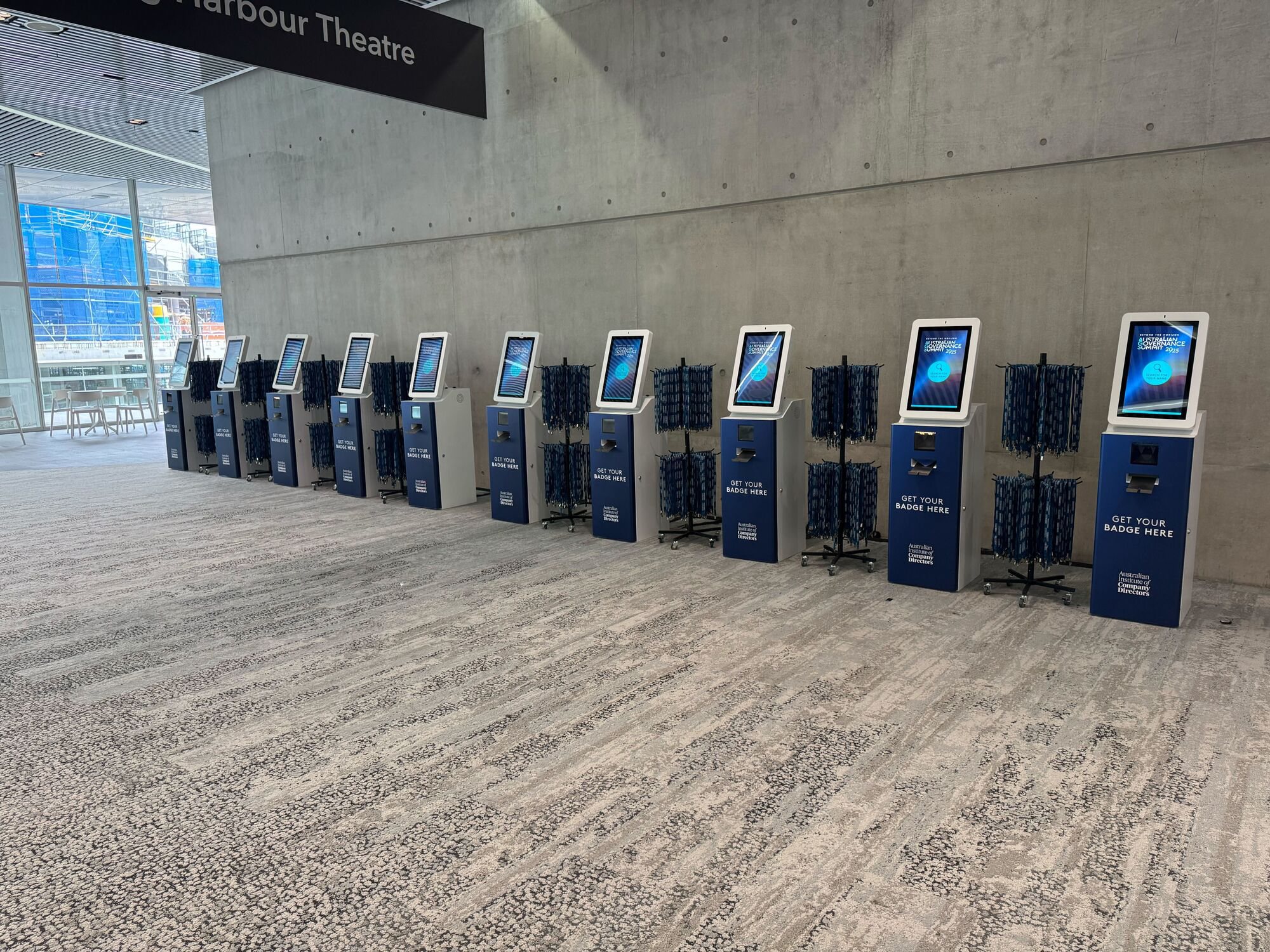 A long row of Max kiosks at the Australian Governance Summit