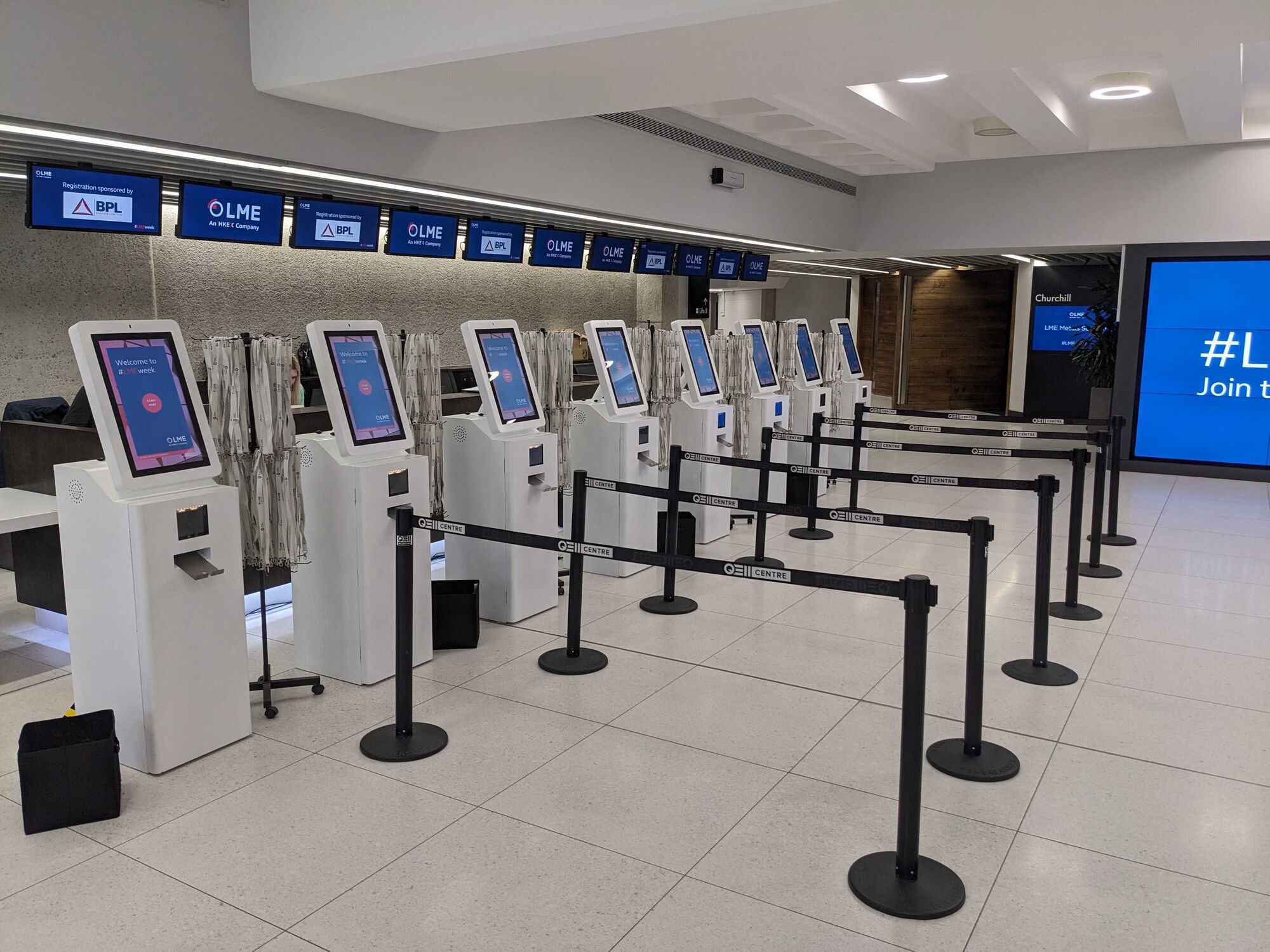 Max kiosks with queue barriers at an LME event at the QEII Centre