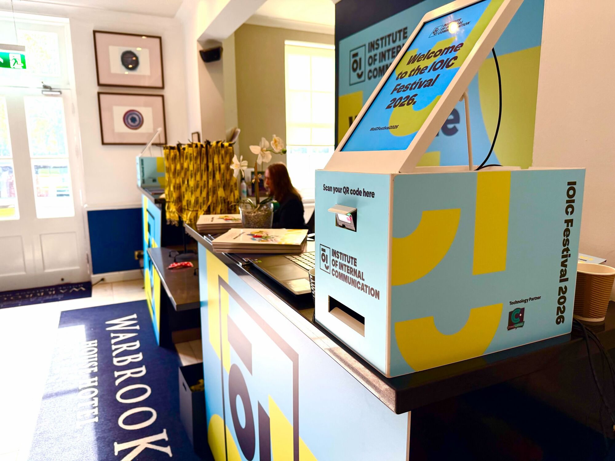 A branded Mini kiosk on the registration desk at IOIC Festival