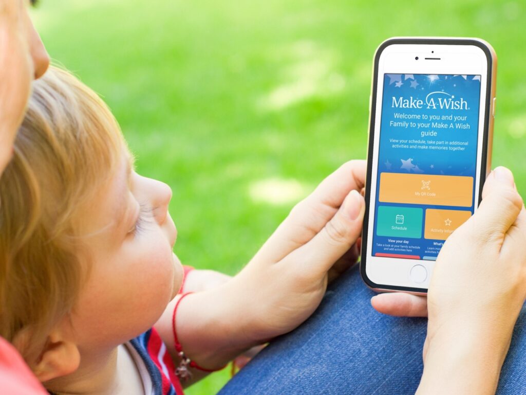 Make a Wish Uk, My Wish App, Event App, Event Tech, Mom and Child using the My Wish App, Customisable Mobile App, CrowdComms, Case Study, Event Tech Solutions